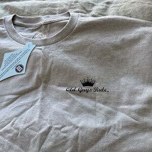Old guys rule men’s grey T-shirt. Perfect for the cigar smoker in your life.